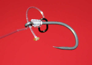 Burn the end of link until it is close to the eye of the hook