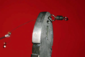 Burn the end of link until it is close to the eye of the hook